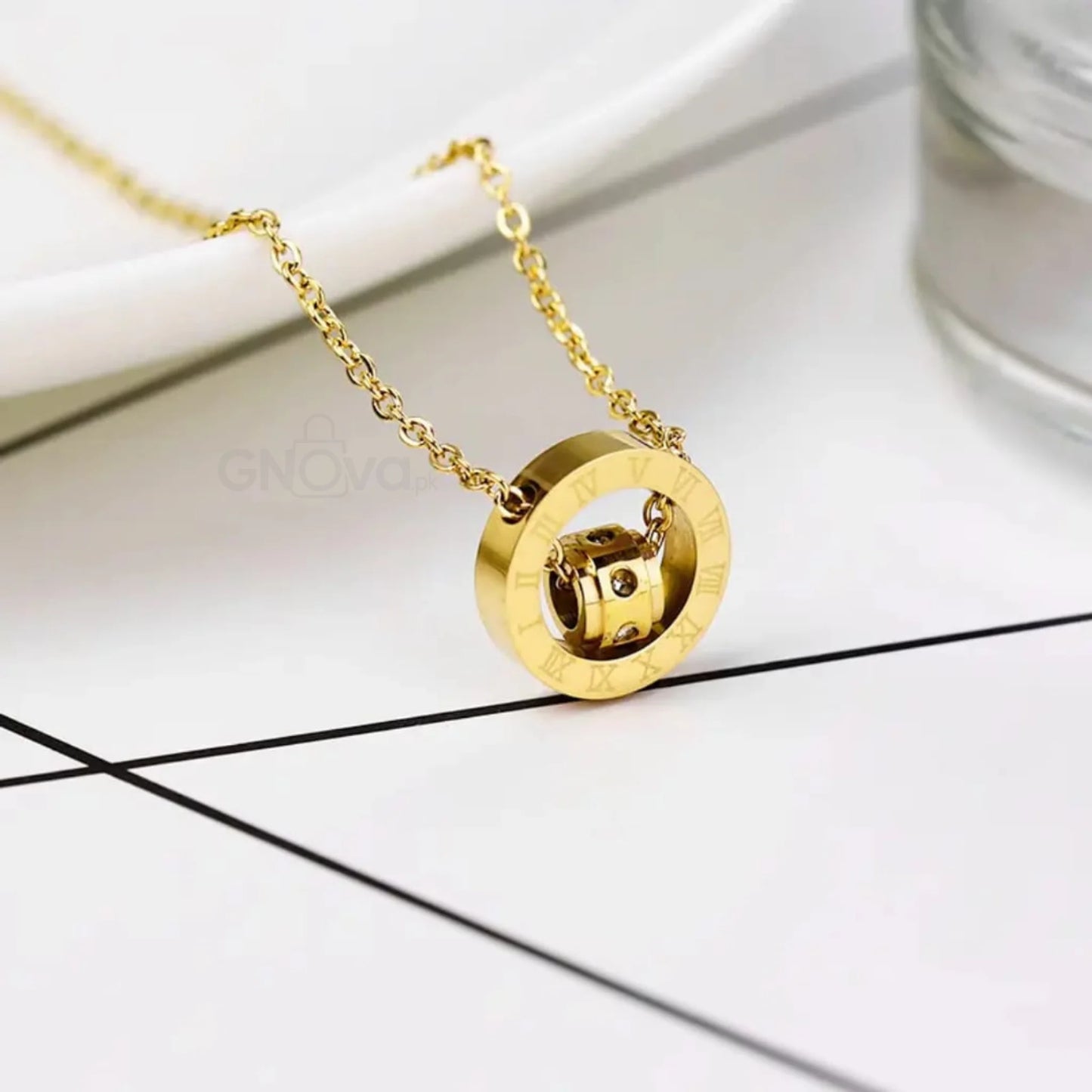 Roman Rotating Pendant Necklace